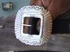 detail of buckle of third phase concho belt