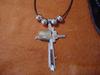 pueblo cross with silver bead and leather cord