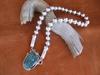 Silver bead necklace and turquoise pendant by Leroy Begay